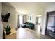 Inviting living room with stylish furniture, and open doorway to the next room at 1334 Legacy Ct, Indianapolis, IN 46234