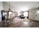 Open-concept living area with dining table, natural light, and cozy seating at 1334 Legacy Ct, Indianapolis, IN 46234