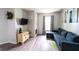 Well-lit living room features a comfortable couch, neutral decor, and a functional layout at 1334 Legacy Ct, Indianapolis, IN 46234