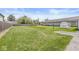 This backyard boasts a well-maintained lawn, ideal for outdoor activities and leisurely enjoyment at 1391 N Shadeland Ave, Indianapolis, IN 46219