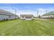 Expansive backyard with lush green lawn offering plenty of space for outdoor activities and relaxation at 1391 N Shadeland Ave, Indianapolis, IN 46219