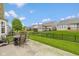 Back yard patio features outdoor seating, a lush lawn, and backyard views at 14018 Powder Dr, Carmel, IN 46033