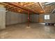 Large basement space with concrete walls and exposed ceiling, ready to be finished at 14018 Powder Dr, Carmel, IN 46033