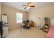 Comfortable bedroom with neutral walls, carpet, and ceiling fan at 14018 Powder Dr, Carmel, IN 46033