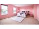 Bedroom with soft carpet and two windows, offering ample natural light and cozy carpet at 1404 Norton Dr, Greenwood, IN 46143