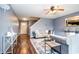 Inviting living room showcasing hardwood floors, and access to front door and staircase at 1404 Norton Dr, Greenwood, IN 46143