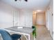 Office space with a modern desk and chair setup with a view down the hallway at 1404 Norton Dr, Greenwood, IN 46143