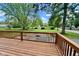 Back deck overlooking lush backyard with green trees and grass at 1601 E Edwards Ave, Indianapolis, IN 46227