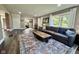 Cozy living room featuring a comfortable sofa, area rug, and lots of natural light at 1601 E Edwards Ave, Indianapolis, IN 46227