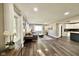 Open-concept living room with dark wood floors, ample natural light, and stylish decor at 1601 E Edwards Ave, Indianapolis, IN 46227