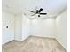 Spacious bedroom with plush carpeting, fresh paint, recessed lighting, and a ceiling fan at 1721 Thaddeus St, Indianapolis, IN 46203