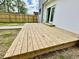 A backyard wooden deck, perfect for outdoor relaxation and entertainment at 1721 Thaddeus St, Indianapolis, IN 46203