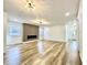 Spacious living room with a modern fireplace and neutral decor at 1721 Thaddeus St, Indianapolis, IN 46203