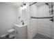 Modern bathroom featuring a tiled shower with matte black fixtures and a vanity at 1737 W 1000 N, Alexandria, IN 46001
