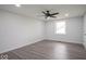 Bedroom with hardwood floors, ceiling fan, and natural light from the window at 1737 W 1000 N, Alexandria, IN 46001