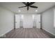Bright bedroom with open closet doors reveals shelving for optimal storage and organization at 1737 W 1000 N, Alexandria, IN 46001