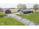 Charming single-story home boasts a spacious two-car garage and well-manicured lawn at 1737 W 1000 N, Alexandria, IN 46001