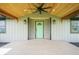 Charming porch area featuring wooden ceiling and door, adding inviting character to the home at 1737 W 1000 N, Alexandria, IN 46001