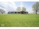 Welcoming single-story home with a spacious front yard, perfect for outdoor enjoyment at 1737 W 1000 N, Alexandria, IN 46001