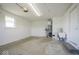 Large garage with water treatment system and natural light from the window at 1737 W 1000 N, Alexandria, IN 46001