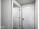 Hallway featuring neutral paint and white doors at 1737 W 1000 N, Alexandria, IN 46001