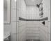 Close-up of tiled shower with upgraded shower head and matte black hardware at 1737 W 1000 N, Alexandria, IN 46001