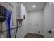 Utility room containing a modern water heater and manifold at 1737 W 1000 N, Alexandria, IN 46001