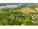 Wide aerial shot with lake view of the property's location and surrounding neighborhood at 19519 Creekview Dr, Noblesville, IN 46062