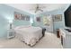 Bedroom with blue walls, white carpet, a ceiling fan and a window at 19519 Creekview Dr, Noblesville, IN 46062