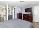 Bedroom with wood-look flooring, a full bathroom, and a comfortable dresser, offering a relaxing private retreat at 2237 W 100 N, Greenfield, IN 46140