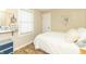 Bright bedroom with light walls, a large window, and wood-look floors, creating a welcoming and comfortable retreat at 2237 W 100 N, Greenfield, IN 46140