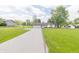 Charming single-story home featuring a two car garage and a well manicured lawn at 2237 W 100 N, Greenfield, IN 46140