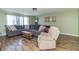 Inviting living room featuring a large sectional sofa and hardwood flooring at 2237 W 100 N, Greenfield, IN 46140
