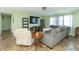 Comfortable living room with cozy seating, TV, and hardwood flooring at 2237 W 100 N, Greenfield, IN 46140