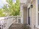 Balcony with a blue door on the side of the house at 2403 N Delaware St, Indianapolis, IN 46205