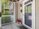 Close-up of the front door, showcasing the house number, stylish fixtures, and a welcoming entrance at 2403 N Delaware St, Indianapolis, IN 46205