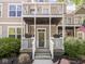 Inviting front porch with flower boxes and a clear view of the house number, 2403 at 2403 N Delaware St, Indianapolis, IN 46205