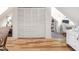 Bright office with hardwood floors, bookshelves, and a sewing machine at 2403 N Delaware St, Indianapolis, IN 46205