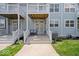 Inviting front porch with seating, perfect for relaxing outdoors and enjoying the neighborhood views at 2405 N Park Ave, Indianapolis, IN 46205