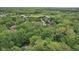 Picture of a quiet neighborhood with lush greenery, a pond, and proximity to urban amenities at 2884 Brook Vista Dr, Carmel, IN 46032