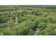 Expansive view of a quiet neighborhood with lush greenery, a pond, and proximity to urban amenities at 2884 Brook Vista Dr, Carmel, IN 46032