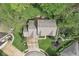 Stunning aerial view of a well-maintained home with lush landscaping, manicured lawn, and a concrete driveway at 2884 Brook Vista Dr, Carmel, IN 46032