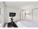 Well-lit bedroom with a Peloton bike and views of the backyard at 2884 Brook Vista Dr, Carmel, IN 46032