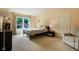 Serene bedroom with neutral tones, a vaulted ceiling, and a cozy window view at 2884 Brook Vista Dr, Carmel, IN 46032