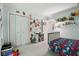 bedroom featuring a charming book nook and whimsical forest themed decor at 2884 Brook Vista Dr, Carmel, IN 46032