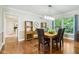 Bright dining area with natural light, hardwood floors, and seamless transition to adjacent living spaces at 2884 Brook Vista Dr, Carmel, IN 46032