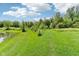Picturesque land featuring a serene pond and lush greenery, creating a peaceful and natural setting at 2884 Brook Vista Dr, Carmel, IN 46032