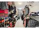 Organized walk-in closet with shelves and rods for ample clothing storage at 2884 Brook Vista Dr, Carmel, IN 46032