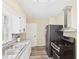 Modern kitchen featuring stainless steel appliances, granite countertops, and ample cabinet space at 2908 Fairview St, Anderson, IN 46016