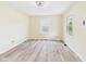 Bright, airy living room with hardwood floors, neutral walls, and large windows offering plenty of natural light at 2908 Fairview St, Anderson, IN 46016
